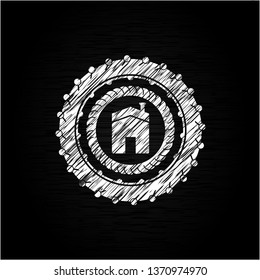 house icon inside chalkboard emblem written on a blackboard