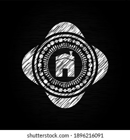 house icon inside chalkboard emblem. 