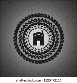 house icon inside dark badge or emblem