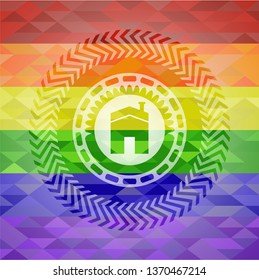 house icon inside emblem on mosaic background with the colors of the LGBT flag