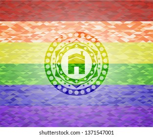 house icon inside emblem on mosaic background with the colors of the LGBT flag