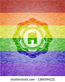house icon inside emblem on mosaic background with the colors of the LGBT flag