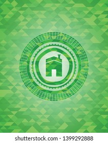 house icon inside green emblem. Mosaic background