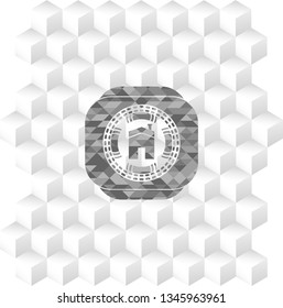 house icon inside grey emblem with geometric cube white background