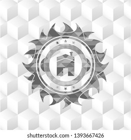 house icon inside grey emblem with cube white background