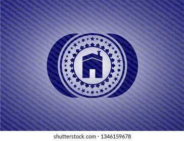 house icon inside jean or denim emblem or badge background