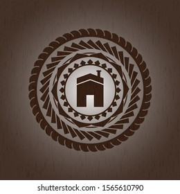 house icon inside realistic wood emblem