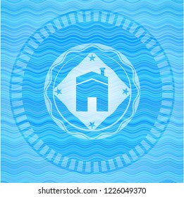 house icon inside sky blue water emblem background.
