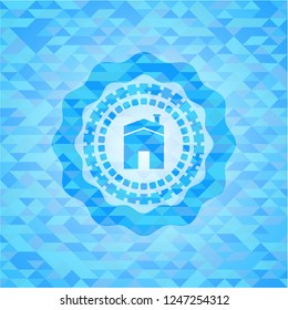 house icon inside sky blue emblem. Mosaic background
