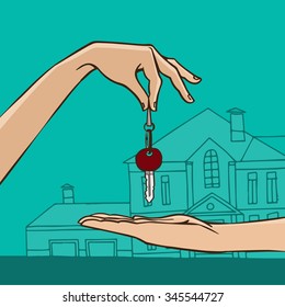 House key from hand to hand - house gift or sale concept