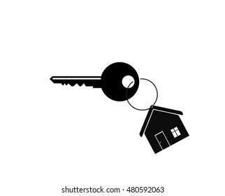 House key on a house shaped keychain. concept for real estate, moving home or renting property