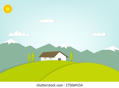 house on a hill on background of mountains