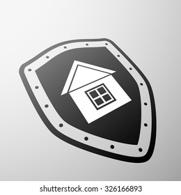 House on the shield. Emblem the real estate. Stock vector illustration.