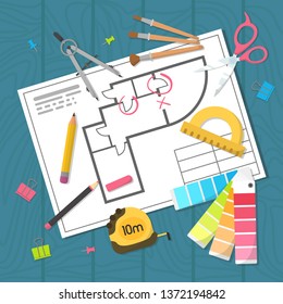 House plan is on the table among the items. Modern flat style vector illustration.