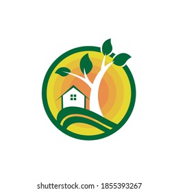 house and tree logos for green housing or green housing logos