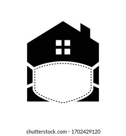 house using a mask, shelter inside the house from the corona virus and lockdown in the house with a mask