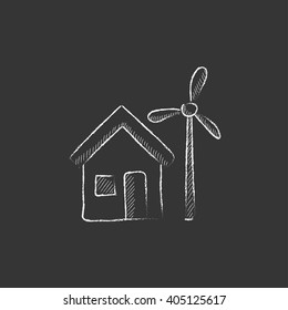 House with windmill. Drawn in chalk icon.
