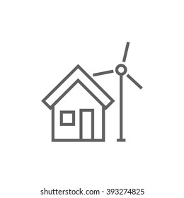 House with windmill line icon.