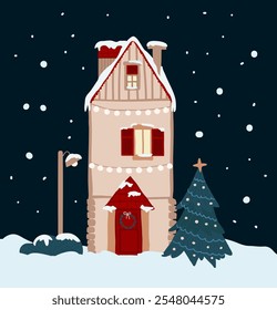 A house in winter scenery, covered in snow at night. Christmas tree in front. Christmas card 