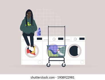 Household chores concept, a young female Black character waiting for their laundry in a coin laundromat