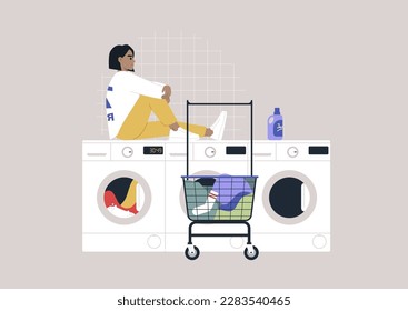 Household chores concept, a young Hispanic character waiting for their laundry in a coin laundromat