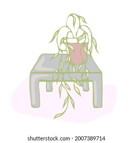 planta de la casa en una olla sobre una mesa colgada en el suelo contra el fondo