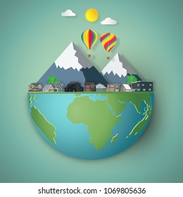Houses, colorful hot airi balloons and mountain on hemisphere green world as business, nature, eco and love earth day concept. vector illustration of paper art and craft style.