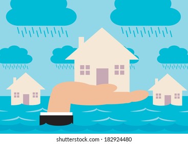 Houses On A Flood Plain, With A Hand Raising Up The House In The Foreground. A Metaphor Regarding Home Insurance And Flood Protection.