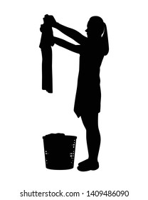 Housewife dry clothes with basket silhouette vector