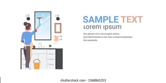 housewife in gloves and apron cleaning mirror with squeegee woman in bathroom doing housework concept rear view female cartoon character full length flat horizontal copy space
