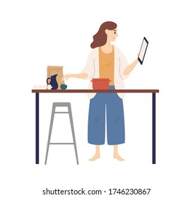 Housewife looking recipe holding tablet during cooking at kitchen vector flat illustration. Domestic woman surfing internet preparing food isolated on white. Female watching tutorial video