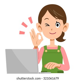 Housewife to show the sign of the laptop and OK