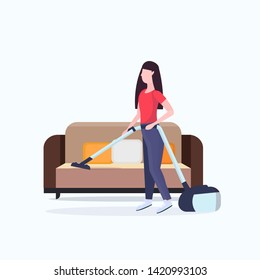 housewife using vacuum cleaner girl vacuuming couch doing housework housekeeping cleaning service concept full length flat