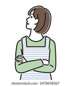 A housewife wearing an apron with her arms folded