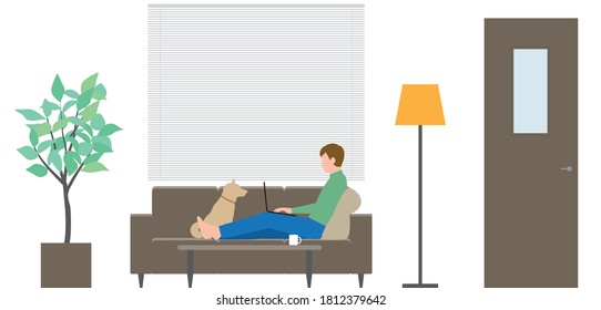 Housing. A man operating a computer on the sofa in the living room