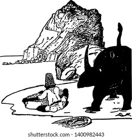How the Rhinoceros Got His Skin this scene shows a man sitting on ground and doing something Rhinoceros standing behind him there is hill in front of man and wheel on ground vintage line drawing