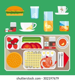 Huge breakfast set - many different types of food: tea, seafood, strawberry, burger, pasta, poridge, eggs, coffee, salad with cucumbers and tomatoes. All of these things are on the green background.