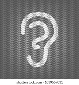 Human anatomy. Ear sign. Vector. White knitted icon on gray knitted background. Isolated.