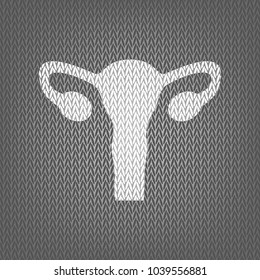 Human anatomy. Uterus sign. Vector. White knitted icon on gray knitted background. Isolated.