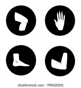 Human body parts glyph icons set. Knee, hand, foot, elbow joint. Vector white silhouettes illustrations in black circles
