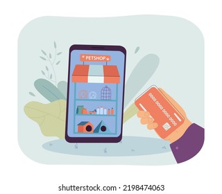 Human buying pet supplies online flat vector illustration. Credit card in human hand and phone with pet shop app on its screen. E-commerce concept for banner, website design or landing web page