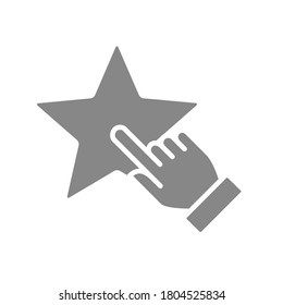 El ser humano elige un icono gris estrella. Revisión del cliente, añadir a favoritos, clasificación, símbolo de retroalimentación