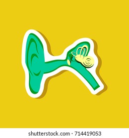 human ear paper sticker on stylish background