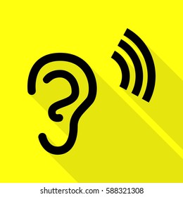 Human ear sign. Black icon with flat style shadow path on yellow background.