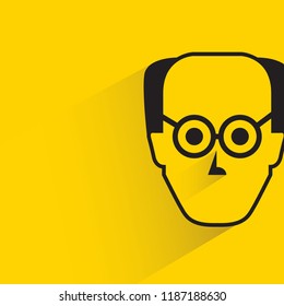 human face with shadow in yellow background
