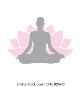 human figure in yoga position with pink lotus flower in behind 