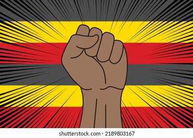 Human fist clenched symbol on flag of Uganda background. Power and strength logo