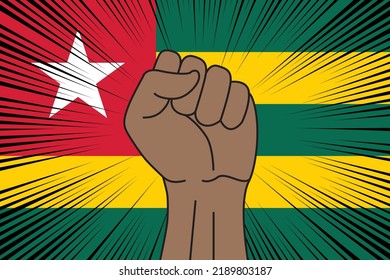 Human fist clenched symbol on flag of Togo background. Power and strength logo