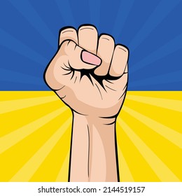 Human fist graphics on Ukraine flag background. Pop-art creative concept. Concept of resistance. Pray for Ukraine. Stop war between Russia and Ukraine. Pray for Ukraine.