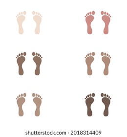 Human footprints of different skin colors. Footprints isolated on white background.